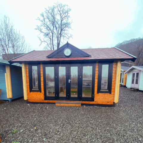 Clockhouse Log Cabin