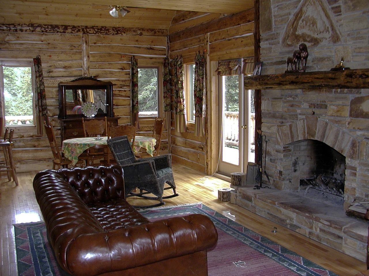 What are the benefits of owning a luxury log cabin?